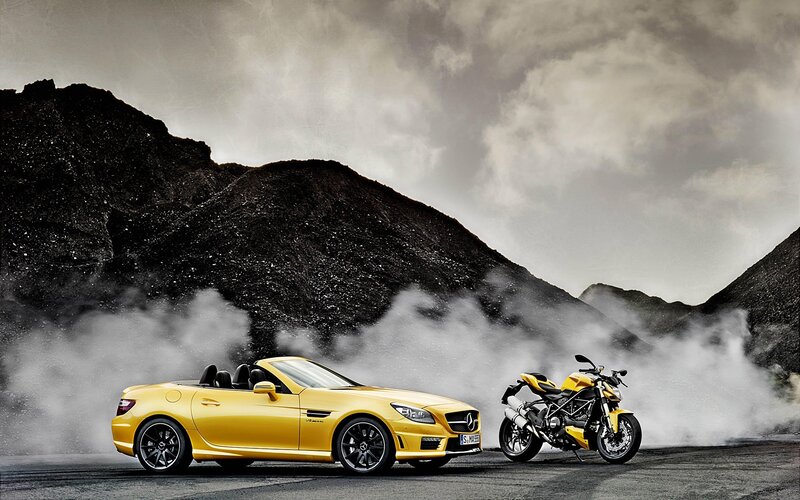 Yellow Convertible Car — Dramatic, Photograph, Motorcycle, Mountain, Smoke