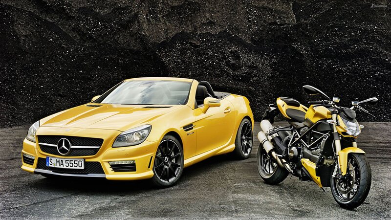 Yellow Convertible Car — Dramatic, Photograph, Motorcycle, Rocky Wall