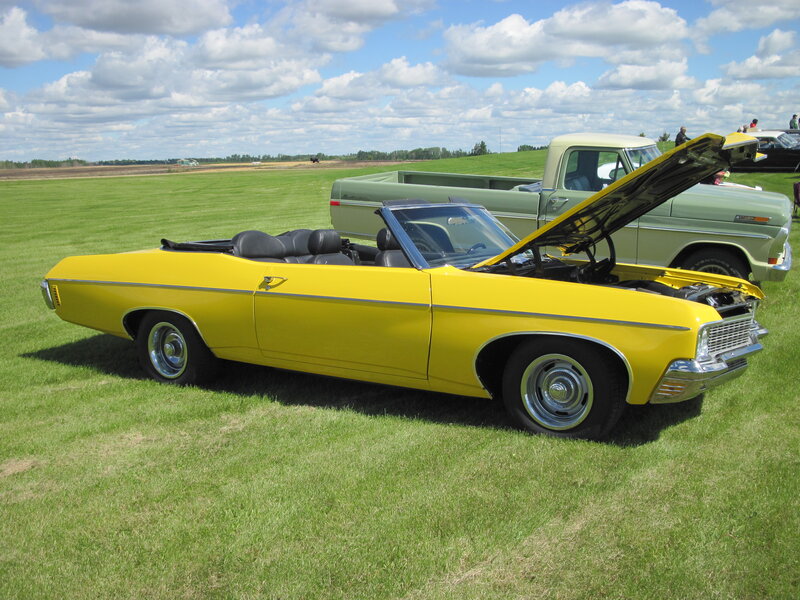 Yellow Convertible Car — Outdoor, Afternoon, Photograph, Green Truck