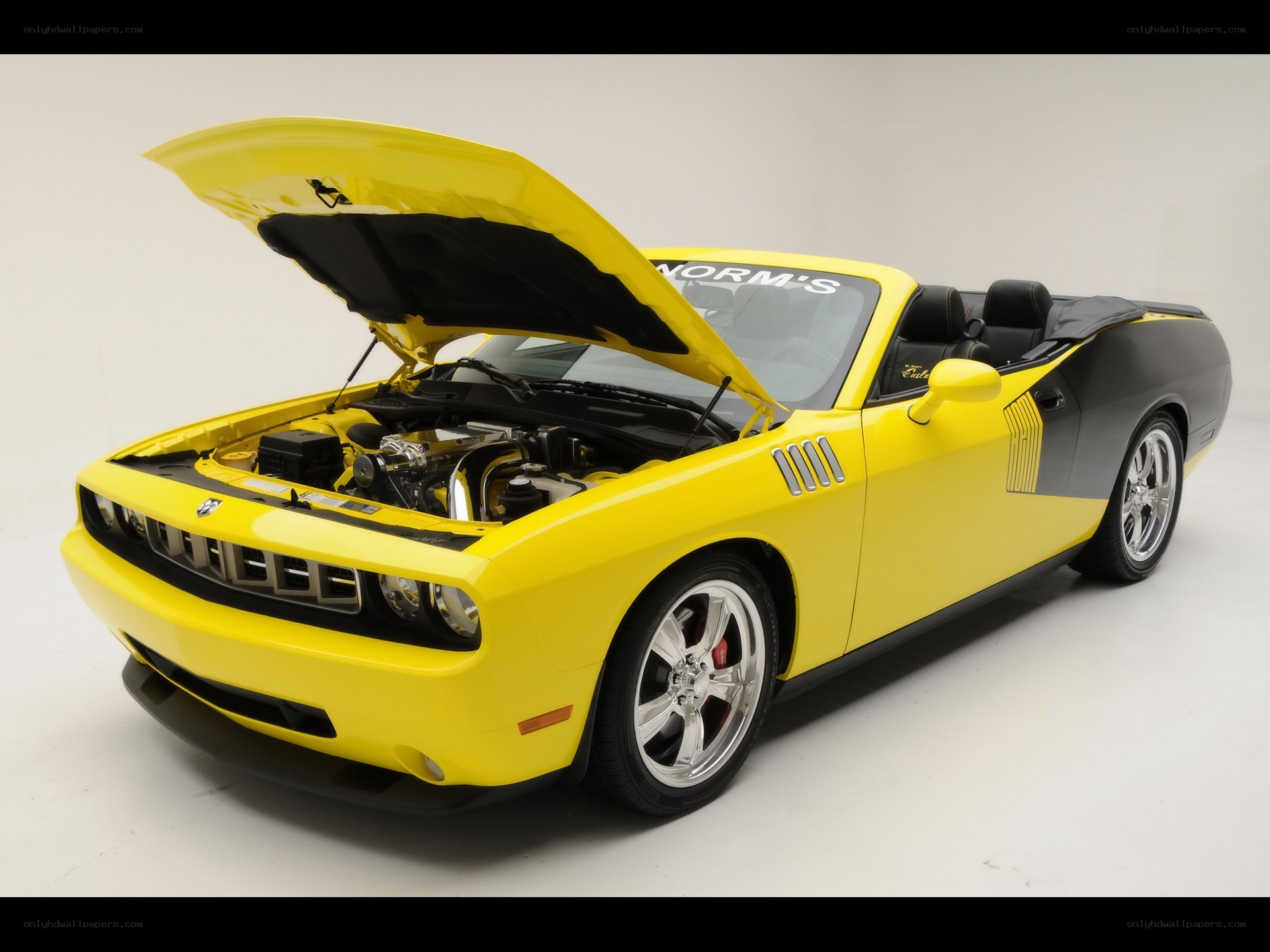 Yellow convertible muscle car