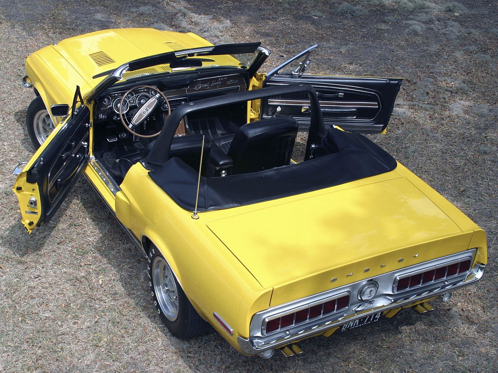 Yellow convertible muscle car