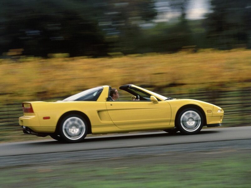 yellow convertible sports car