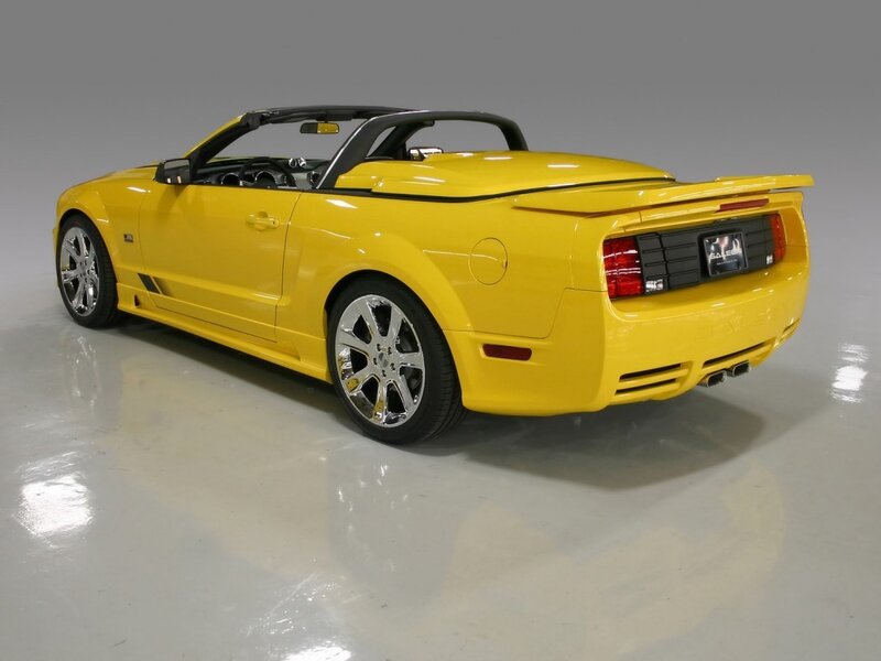 yellow convertible sports car