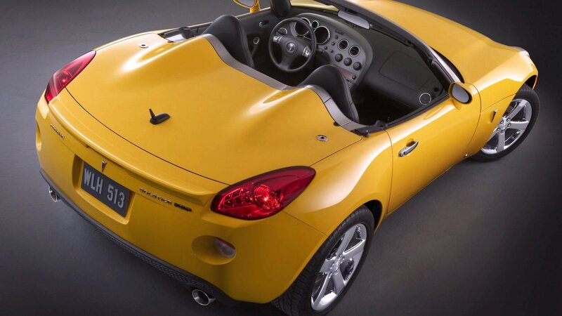 yellow convertible sports car