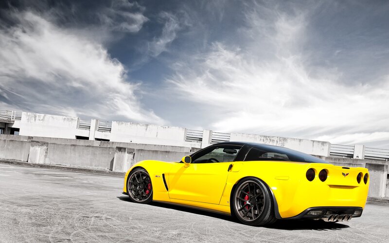 Yellow Corvette Car — Dramatic, Afternoon, Photograph, Concrete Structure