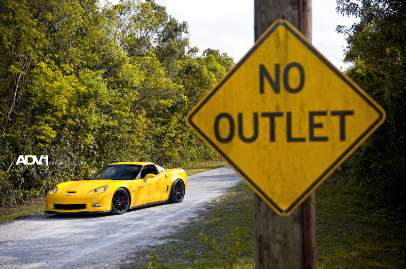 Yellow Corvette Car — Dramatic, Afternoon, Photograph, Road Sign