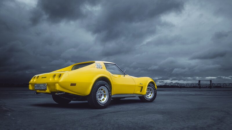 Yellow Corvette Car — Dramatic, Photograph, Cloudy Sky
