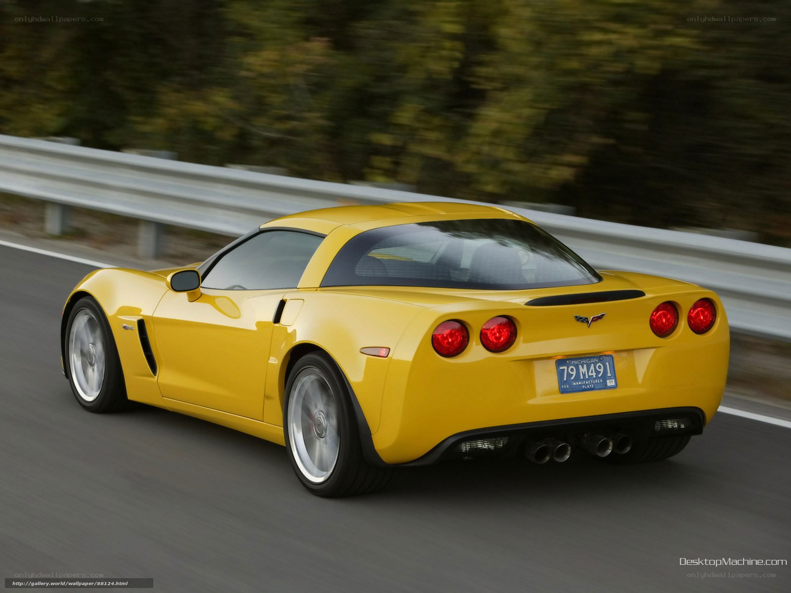 yellow corvette driving on road