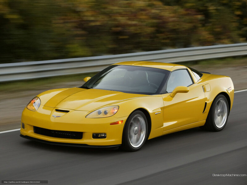 yellow corvette driving on road
