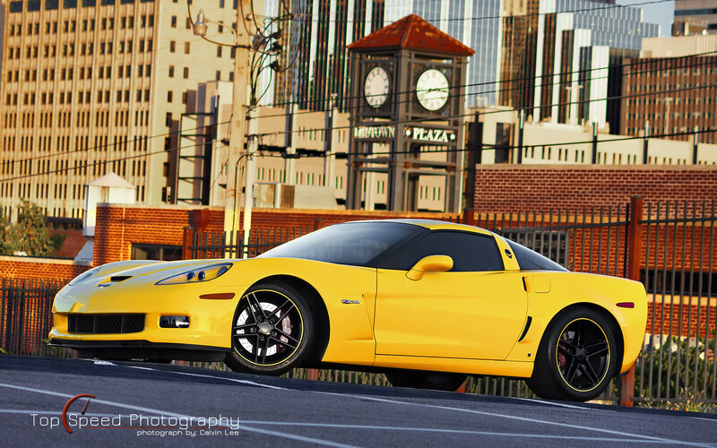 Yellow Corvette in city