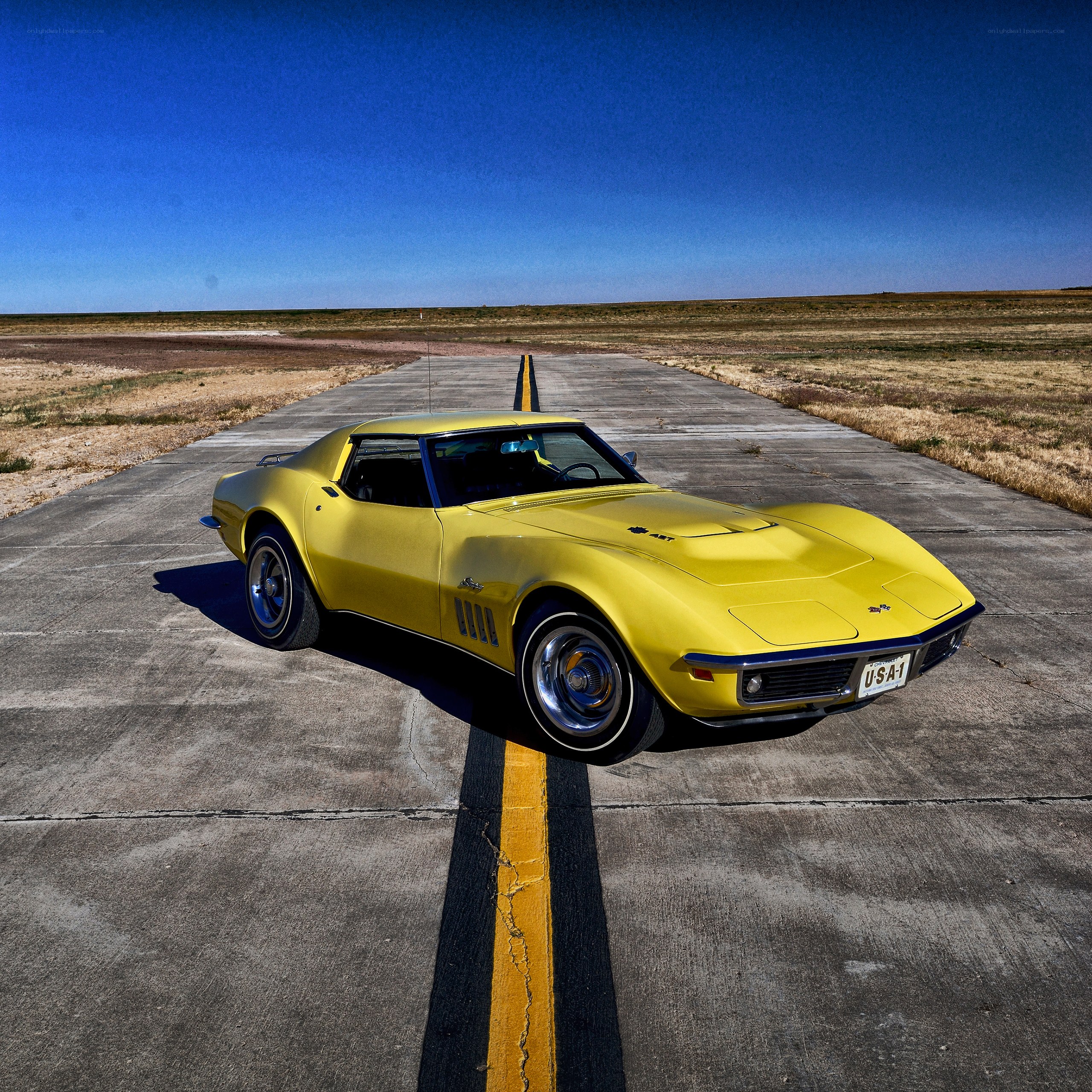 Yellow Corvette on airstrip