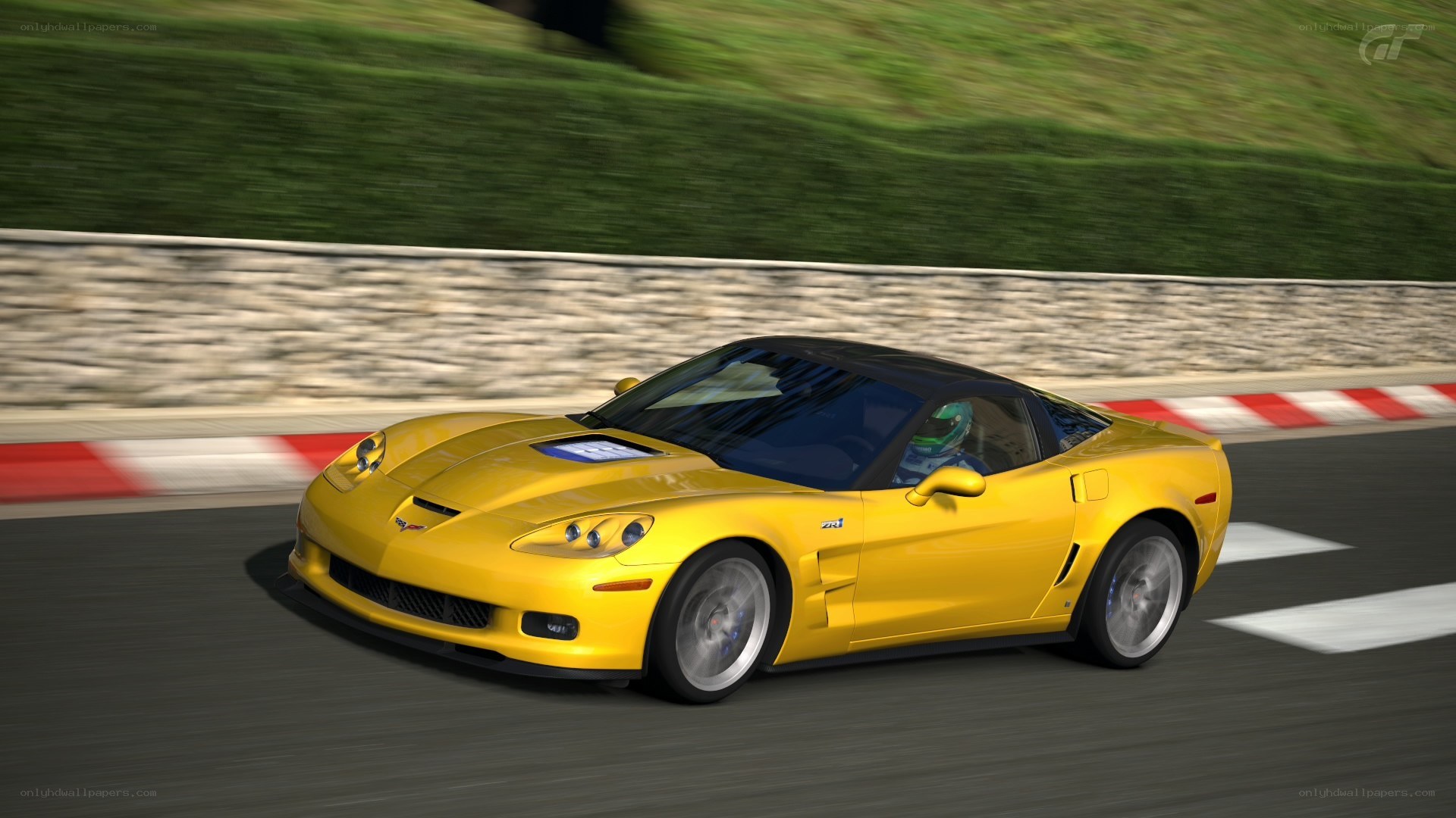 yellow corvette on racetrack