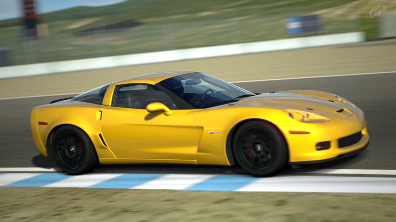 yellow corvette on racetrack