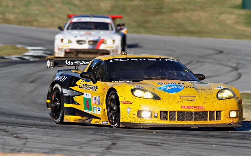 Yellow Corvette racing on track