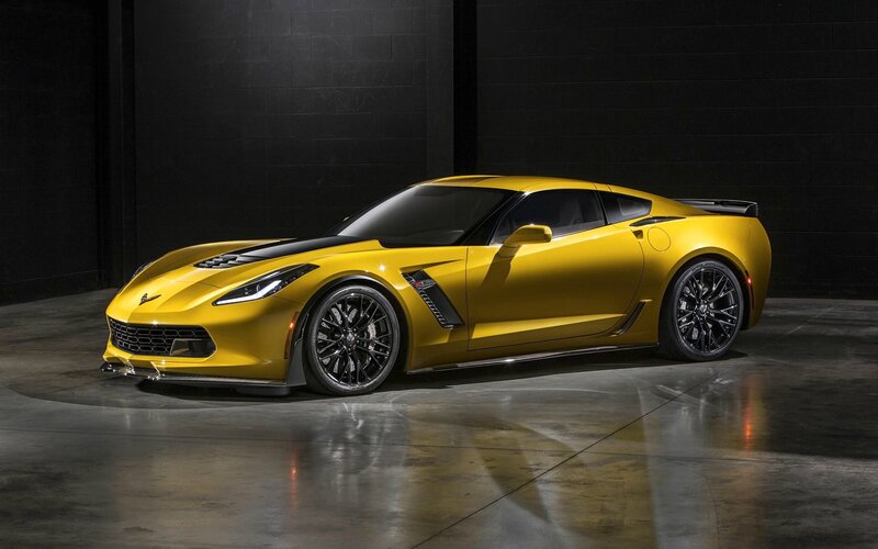 Yellow Corvette Sports Car — Dramatic, Photograph, Black Wheels, Dark Wall