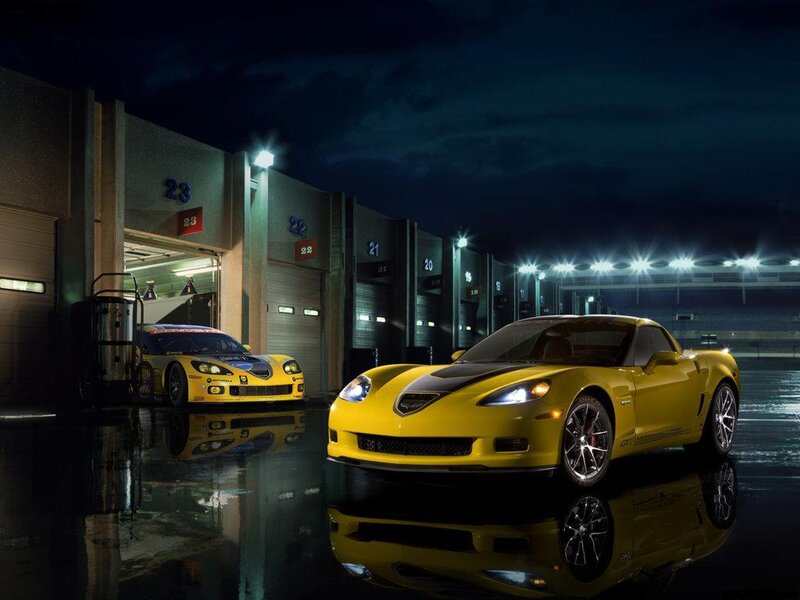 Yellow Corvettes at a racetrack