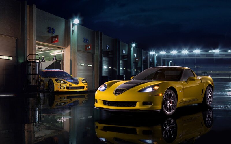 Yellow Corvettes at Night