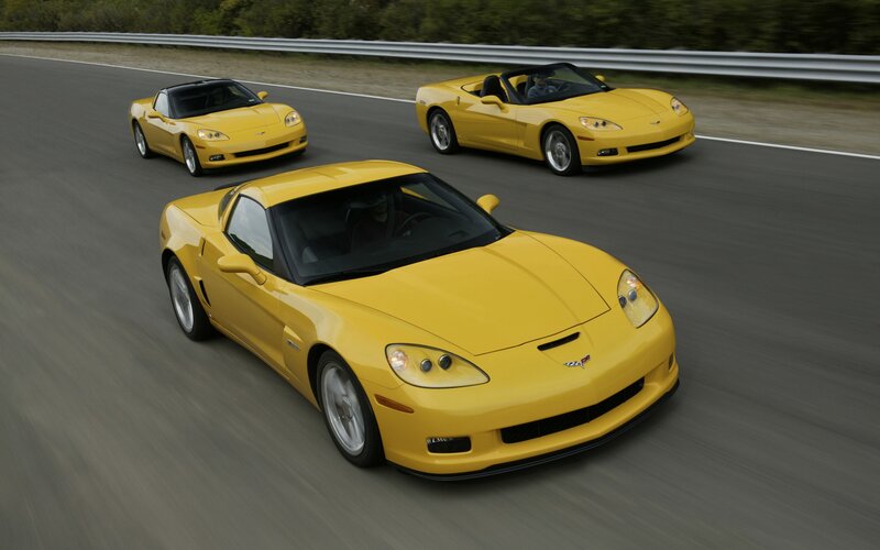 Yellow Corvettes on a racetrack