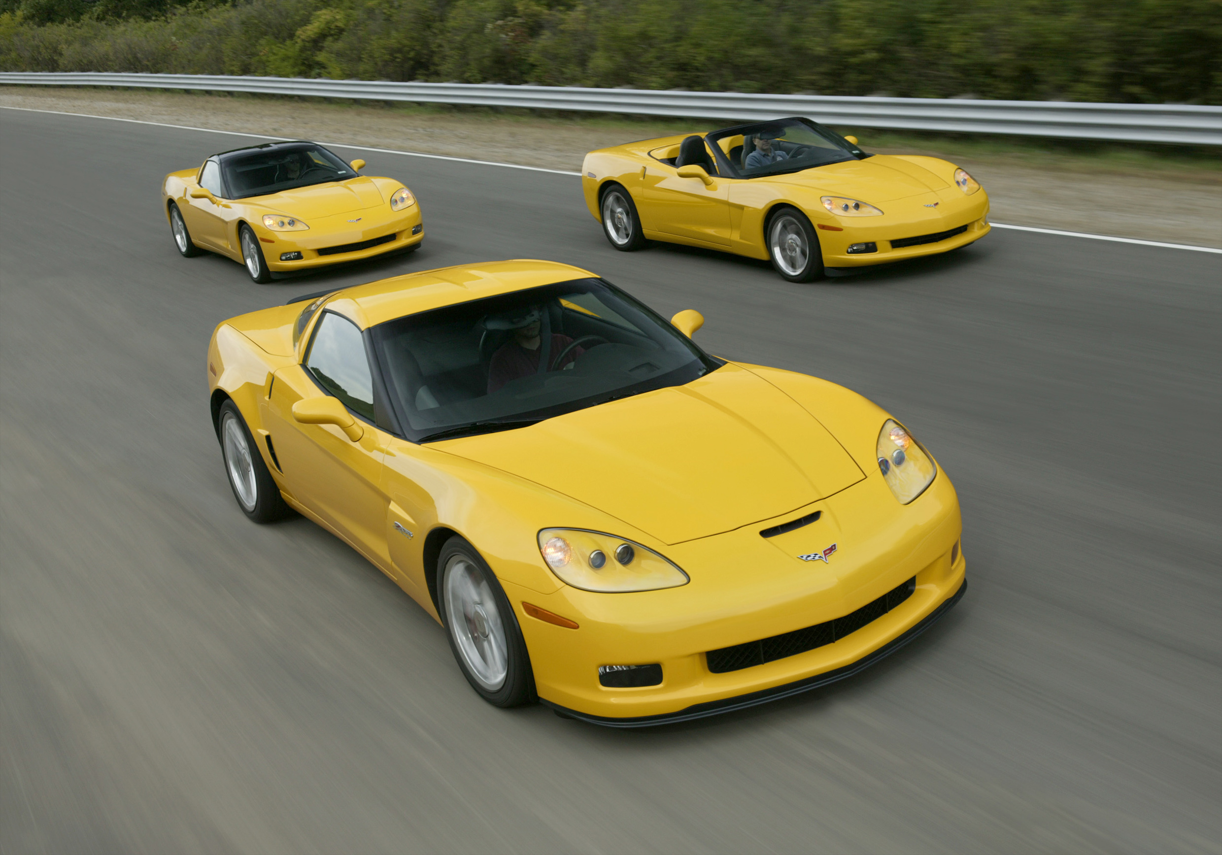 Yellow Corvettes on a road