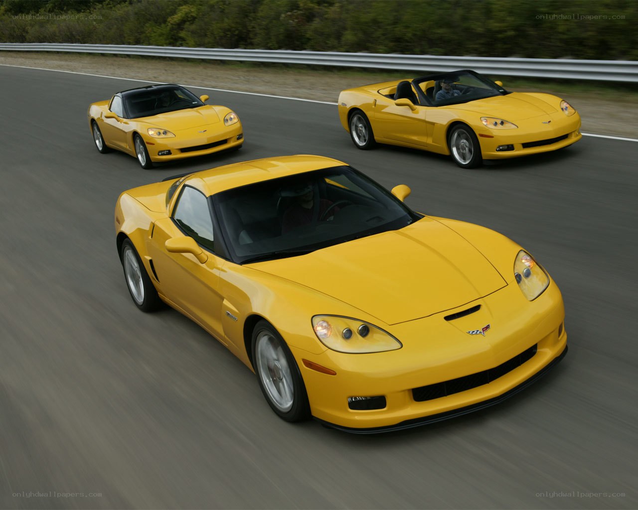 Yellow Corvettes on a track