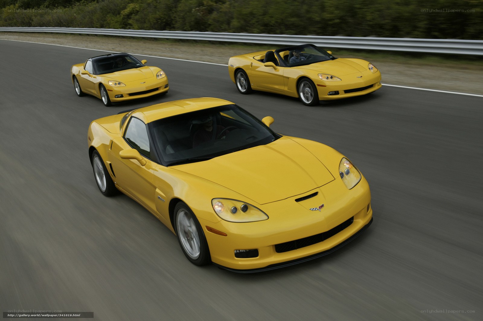 Yellow Corvettes on a track