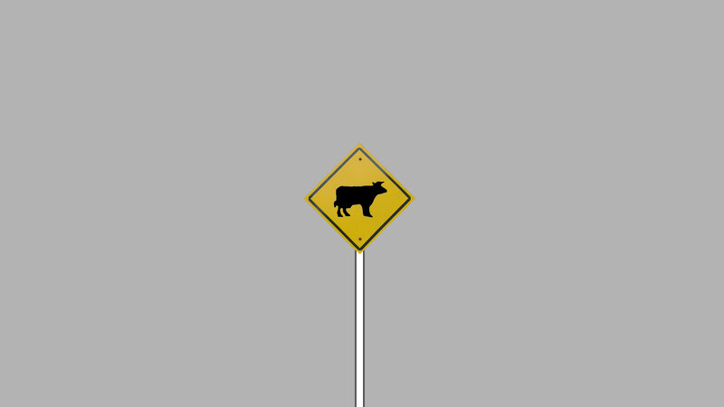 Yellow Cow Crossing Sign