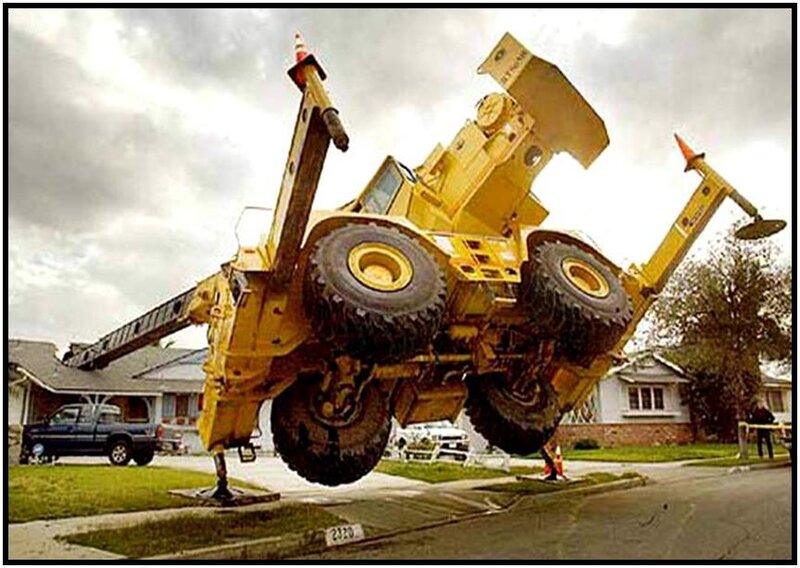 Yellow crane flipped in air