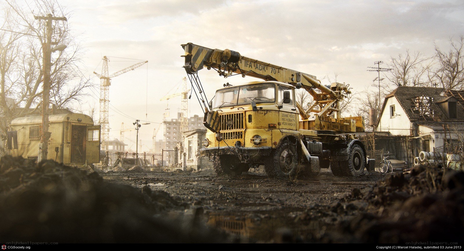 Yellow crane truck in war zone
