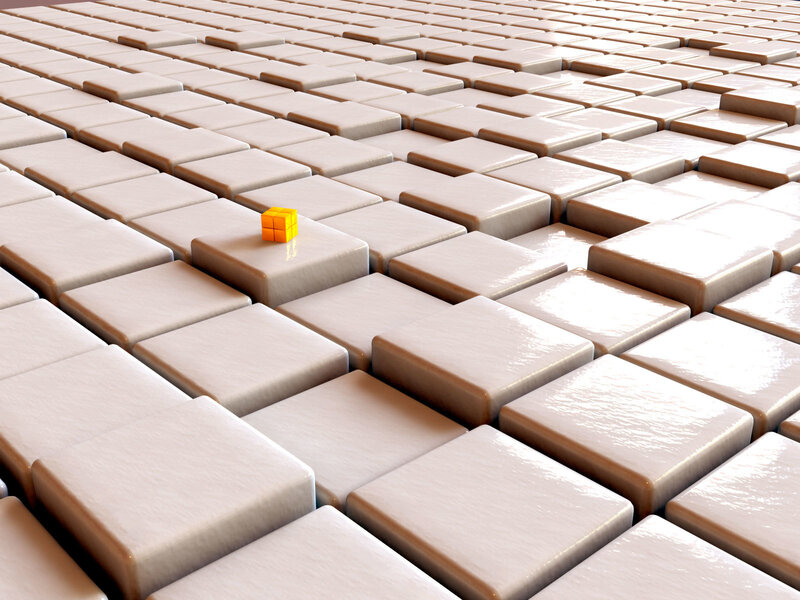 yellow cube on tiled surface