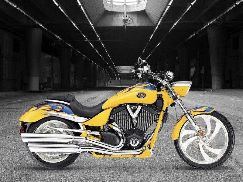 yellow custom motorcycle in tunnel