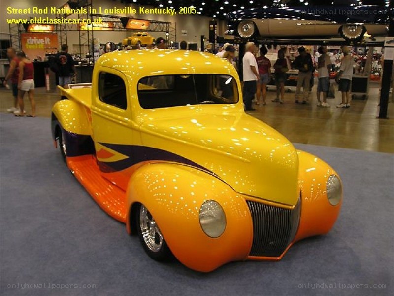 Yellow custom pickup truck at show