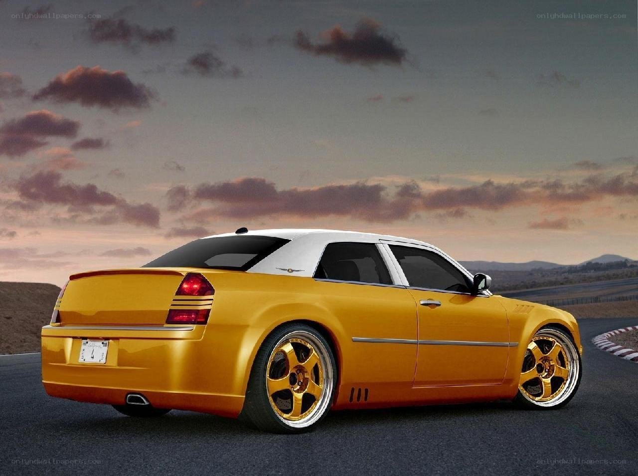 yellow custom sedan on track