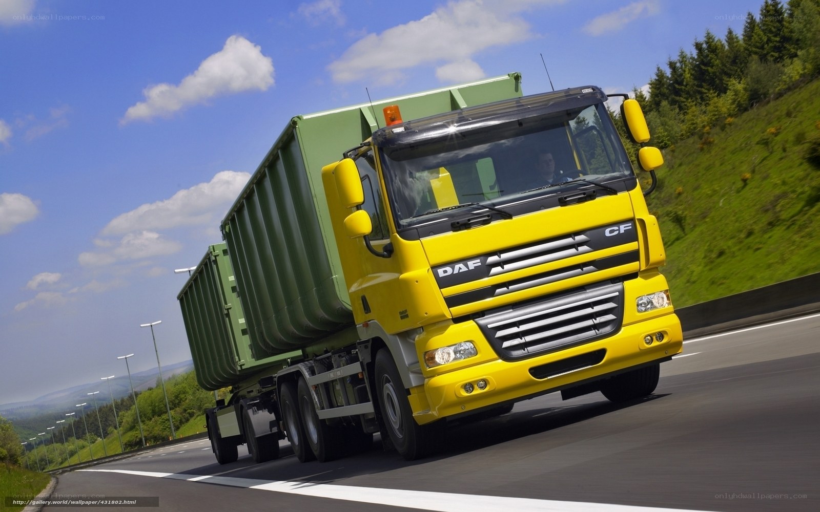 Yellow DAF truck on highway