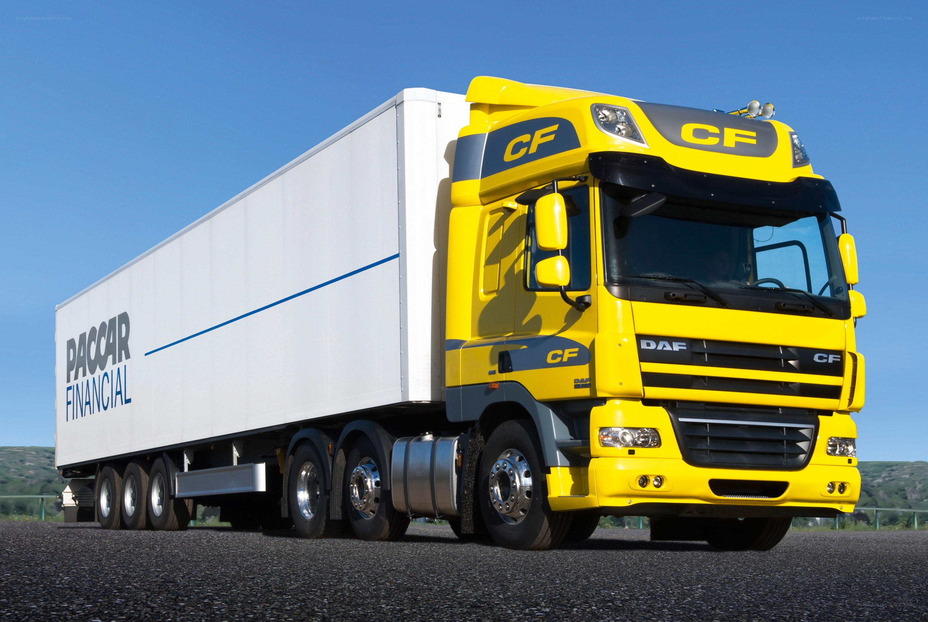 Yellow DAF truck with PacCar trailer