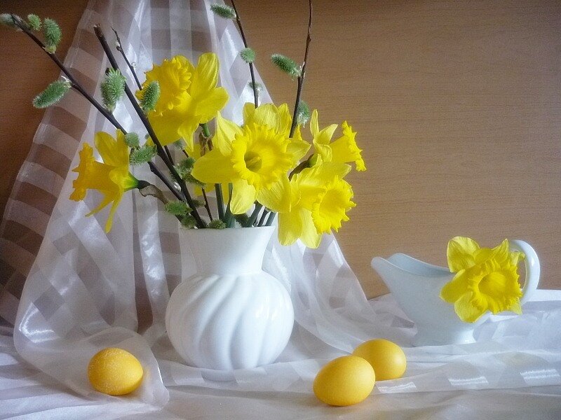 Yellow daffodils and eggs