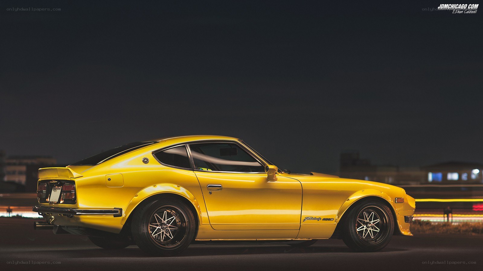 Yellow Datsun 240Z at night