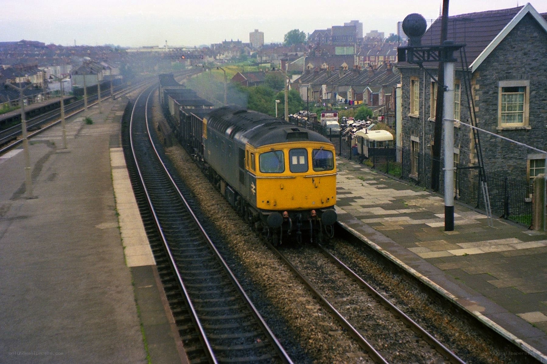 yellow diesel train at station