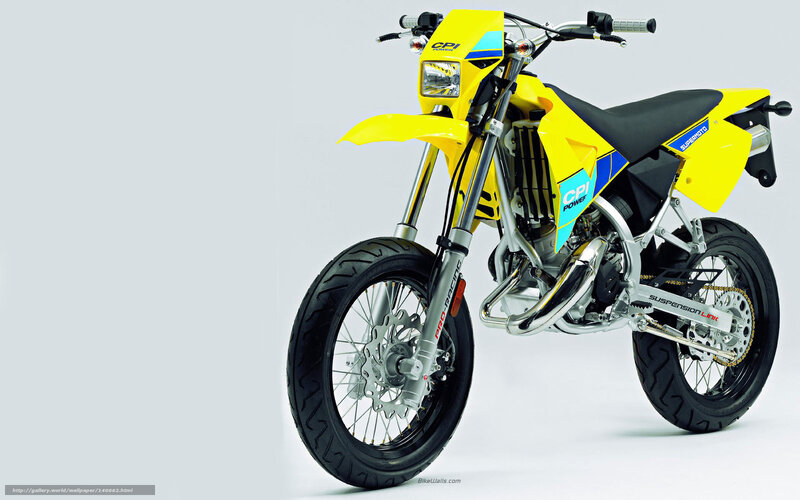 yellow dirt bike motorcycle