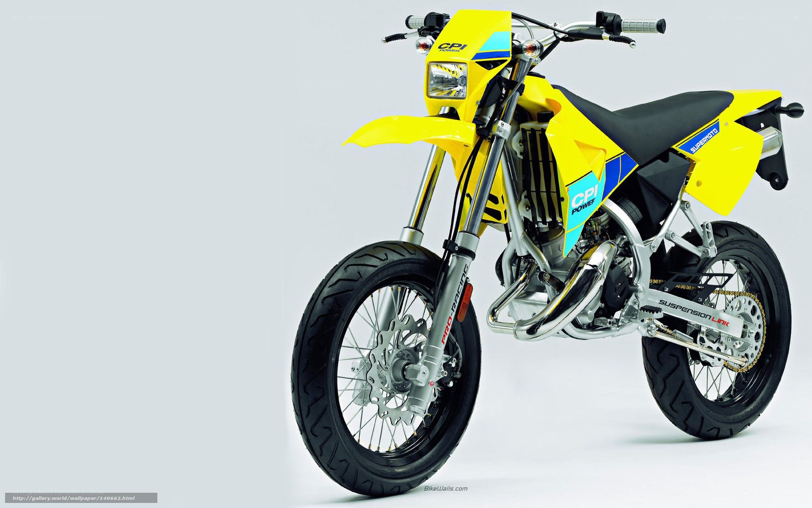 yellow dirt bike motorcycle