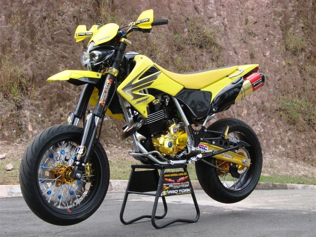 yellow dirt bike on stand