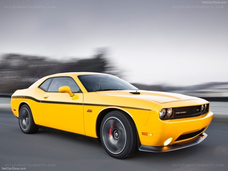 Yellow Dodge Challenger in motion