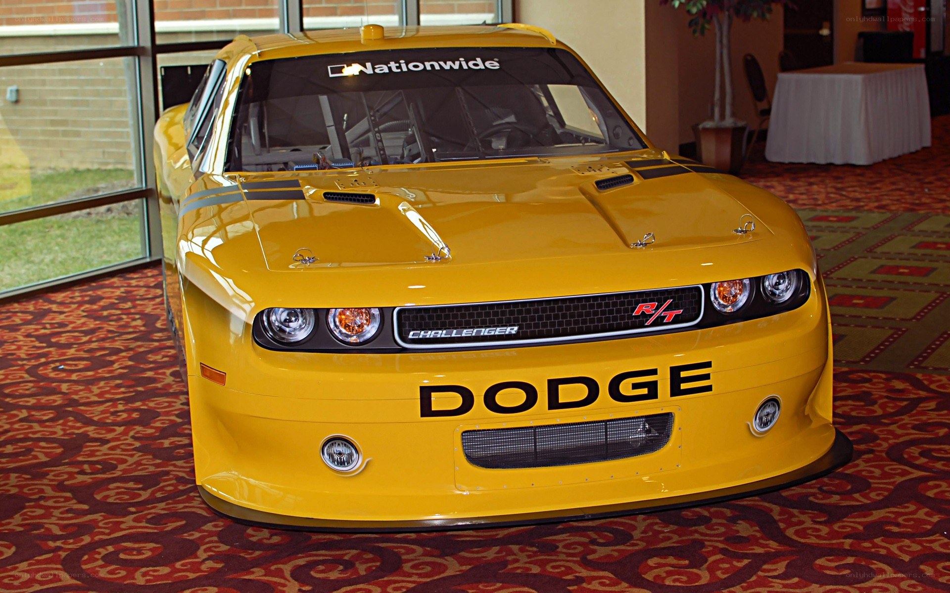 Yellow Dodge Challenger race car