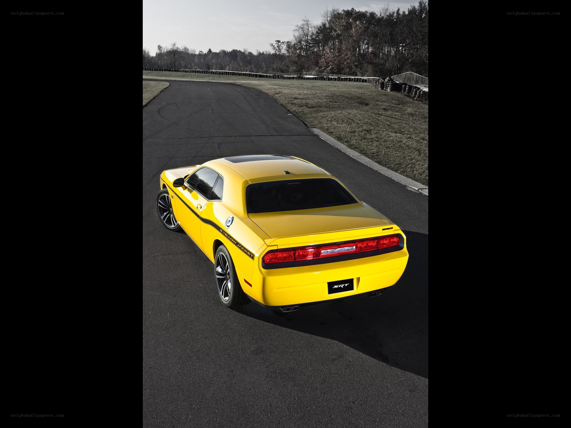 Yellow Dodge Challenger SRT on track