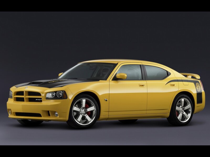 Yellow Dodge Charger — Dramatic, Photograph, Black Hood, Silver Wheels, Rear Spoiler
