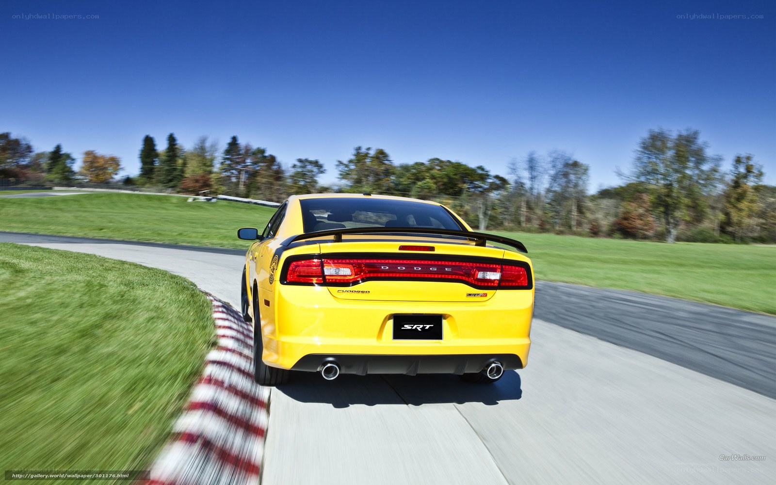 Yellow Dodge Charger SRT on track
