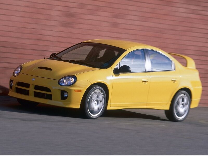 yellow dodge neon srt-4 in motion