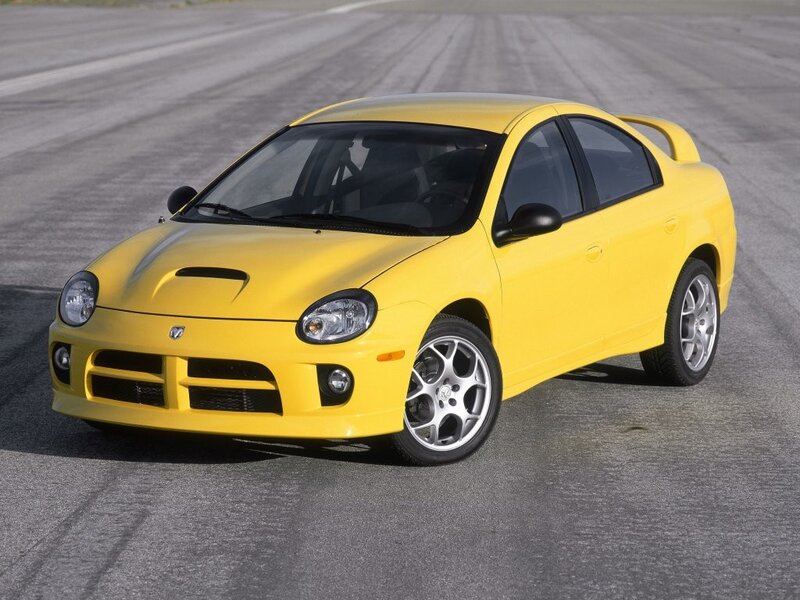 yellow dodge neon srt-4 on track
