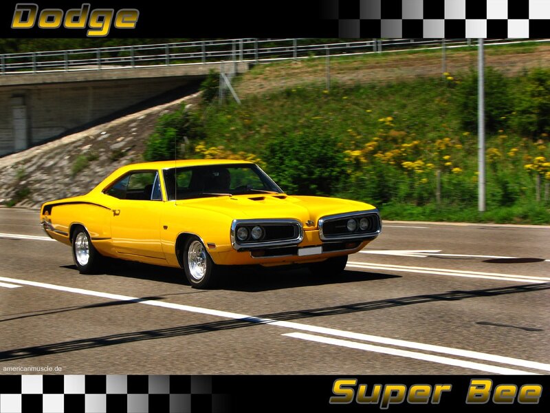 Yellow Dodge Super Bee in motion