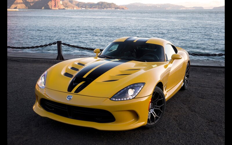 Yellow Dodge Viper by the water