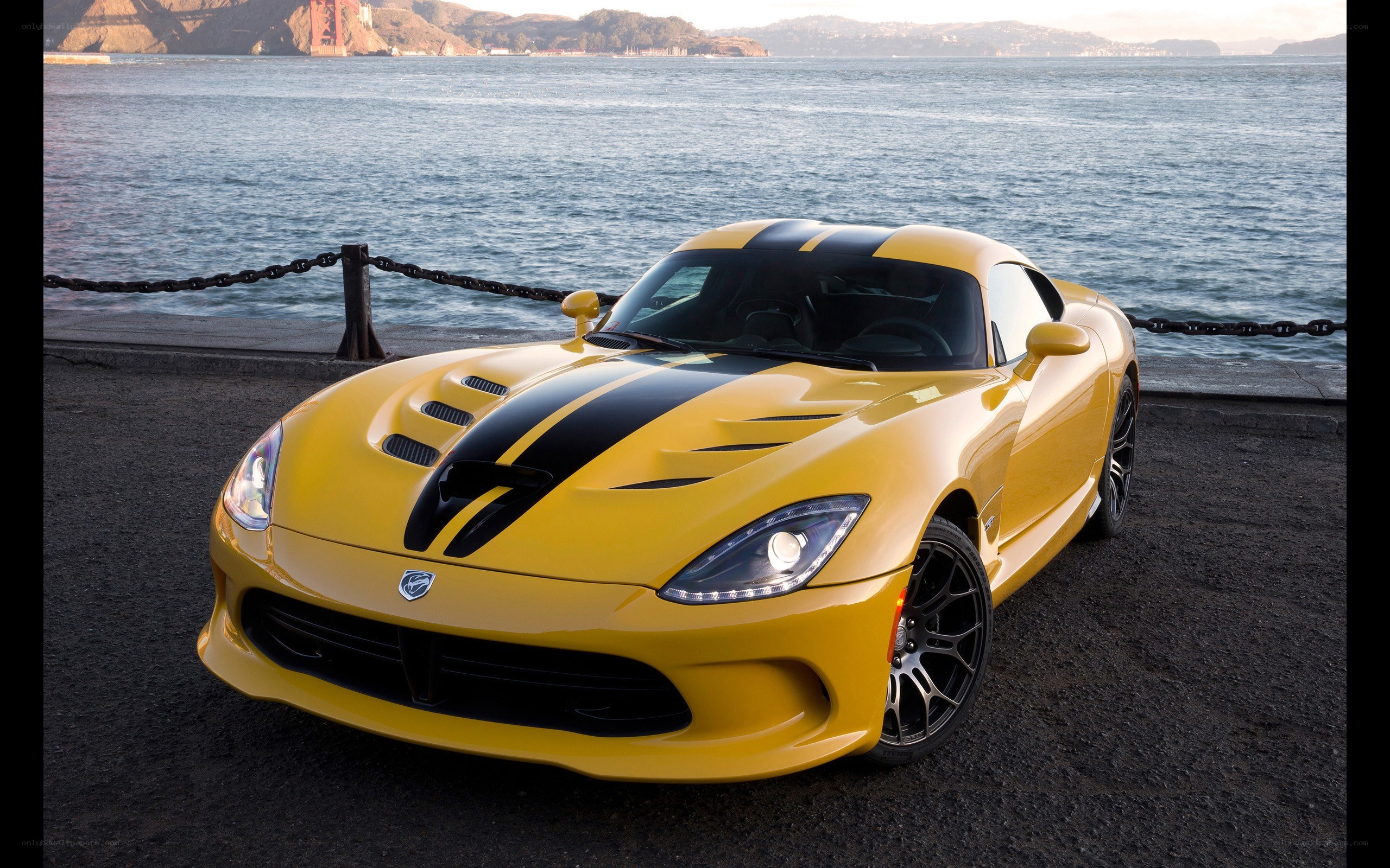 Yellow Dodge Viper by the water